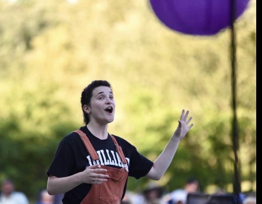 Outdoor Shakespeare performance, balloon overhead